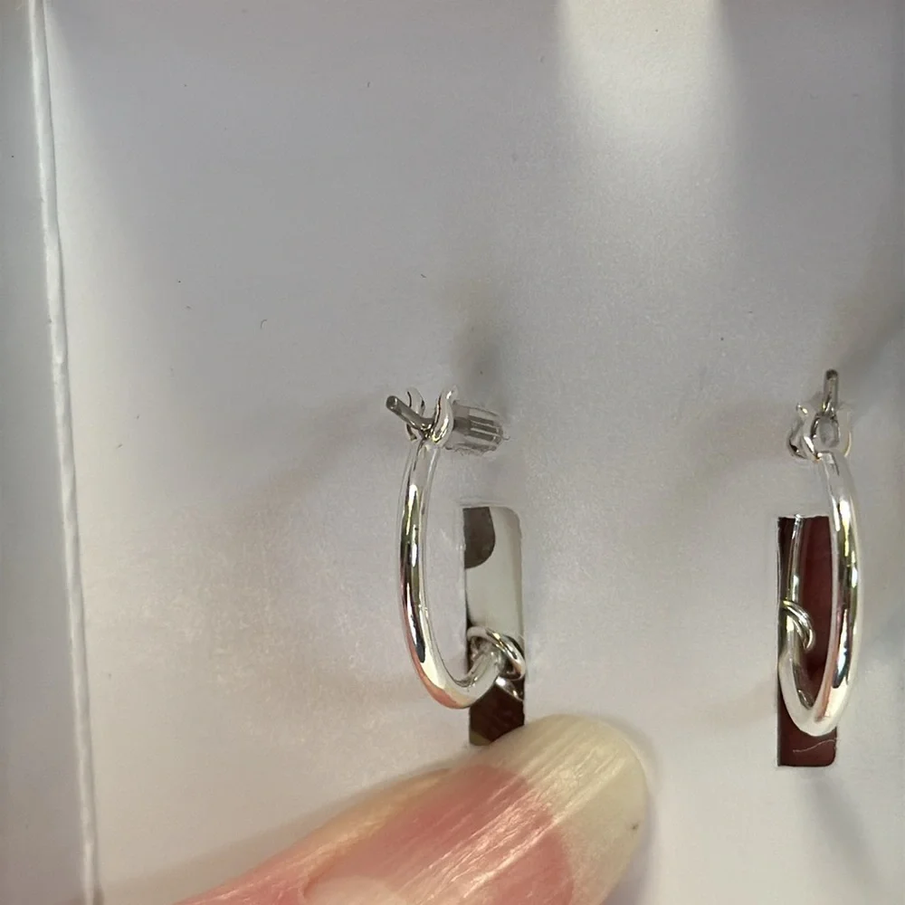 New Hello Kitty Silver Plated Hoop Earrings with White & Pink enamel charm.